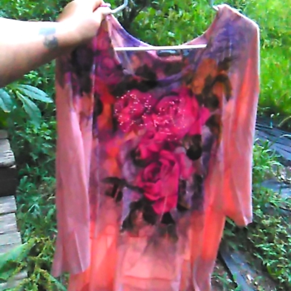 Women's blouse sizing large, branding Notilations